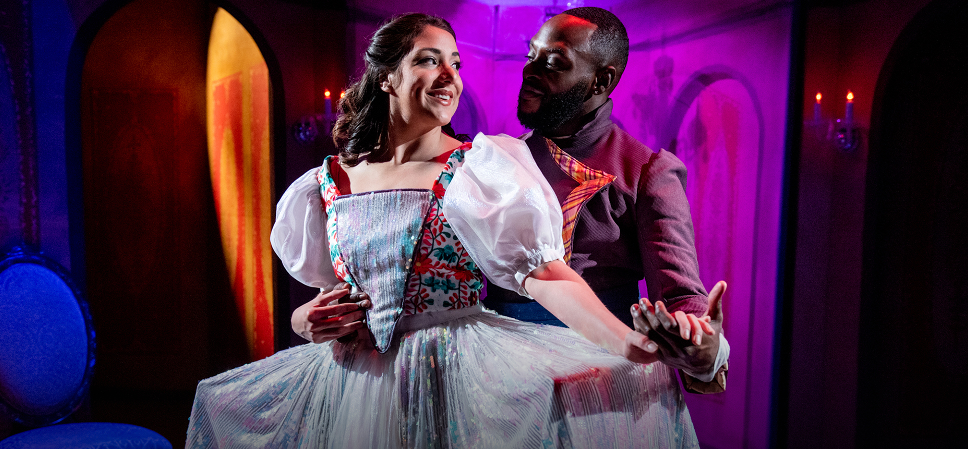 A man and a woman on stage in a play